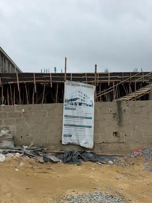 Crescent construction photograph, August 2026, showing the perimeter wall and building formwork